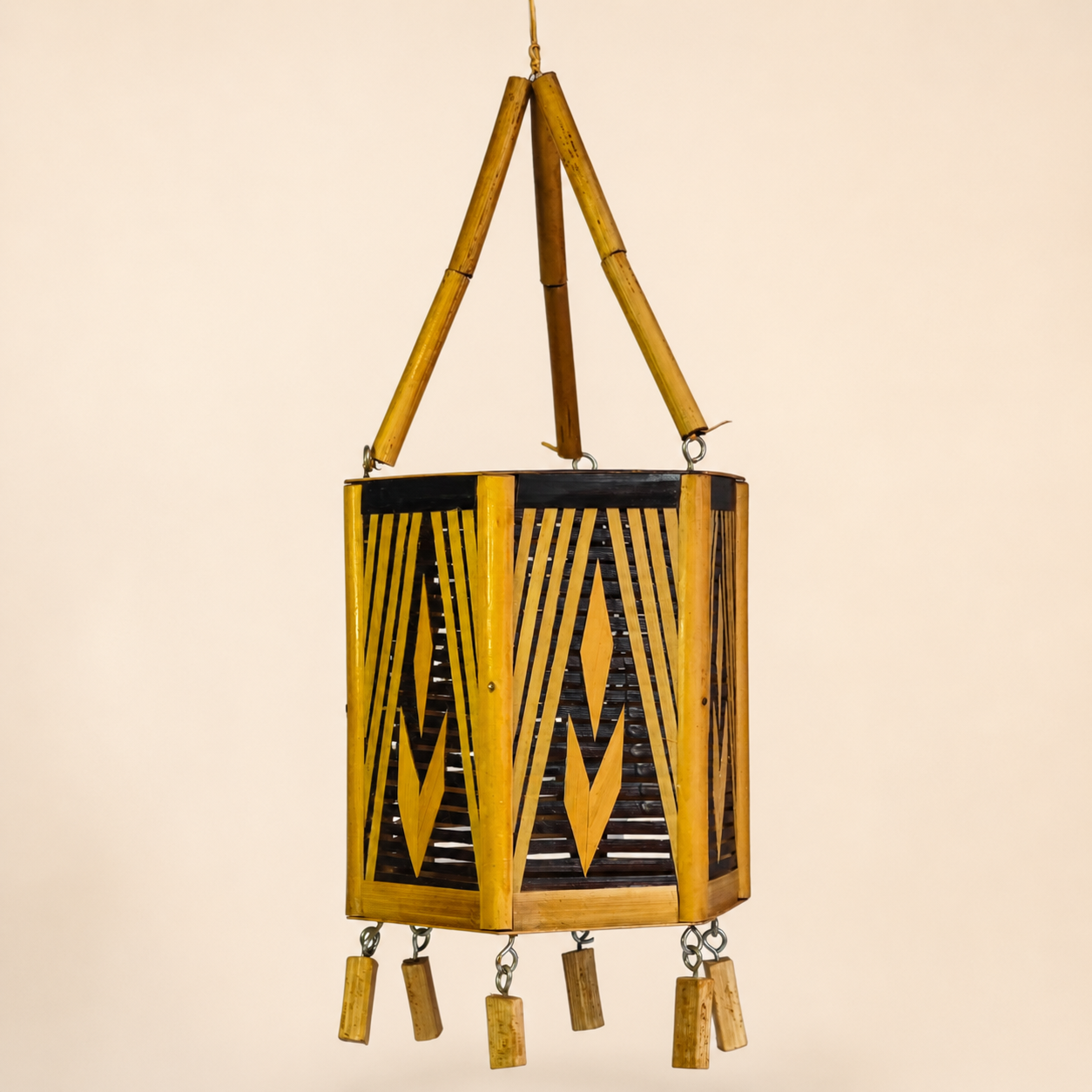 Handcrafted Bastar bamboo hanging lamp on a clean warm ivory studio background