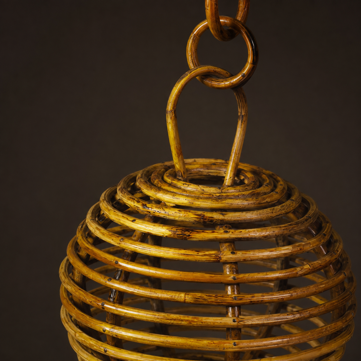 Close view of the bamboo rings, vertical supports, pins and handmade joinery on the round lamp