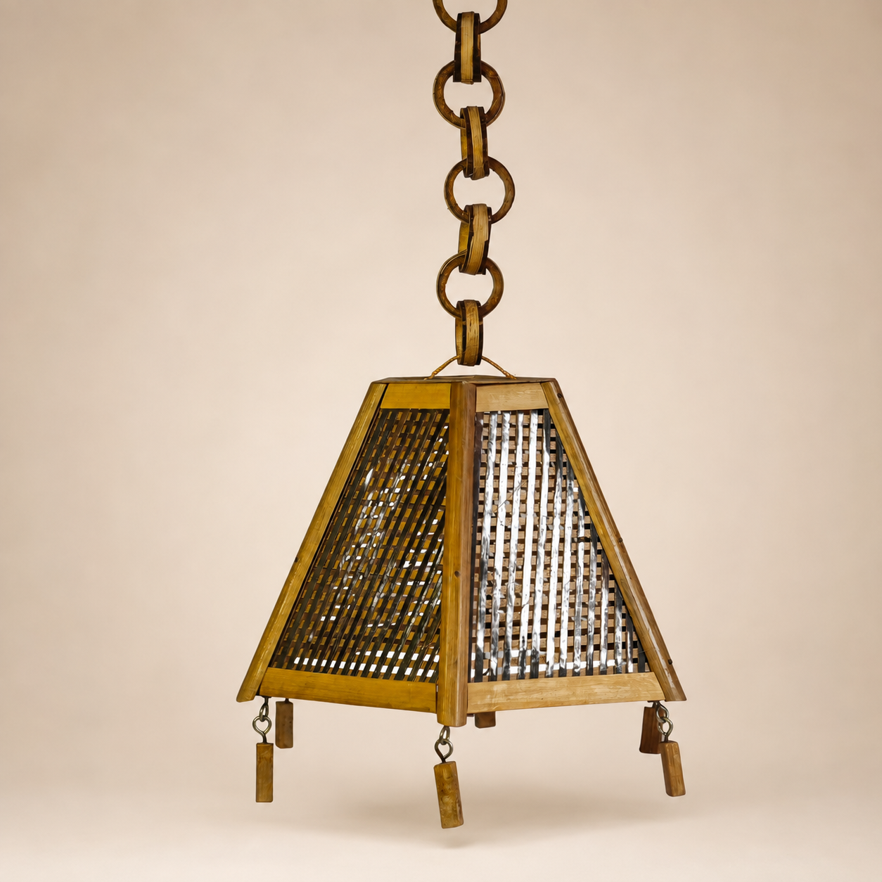 Bastar handcrafted bamboo hanging lamp on a clean warm ivory studio background