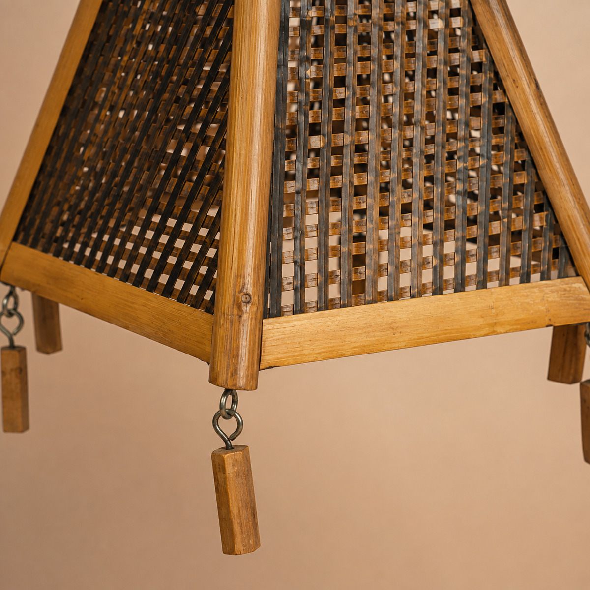 Close detail of the bamboo lattice, frame joints and hanging charm craftsmanship