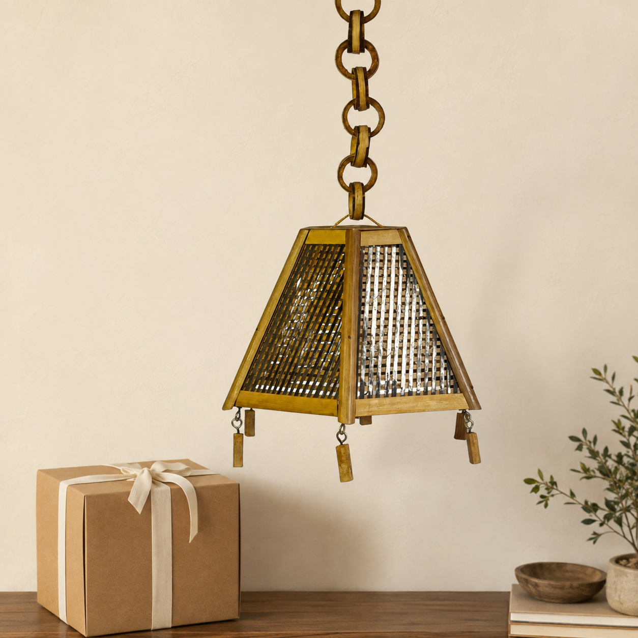 Handcrafted bamboo hanging lamp presented with a kraft gift box for housewarming gifting
