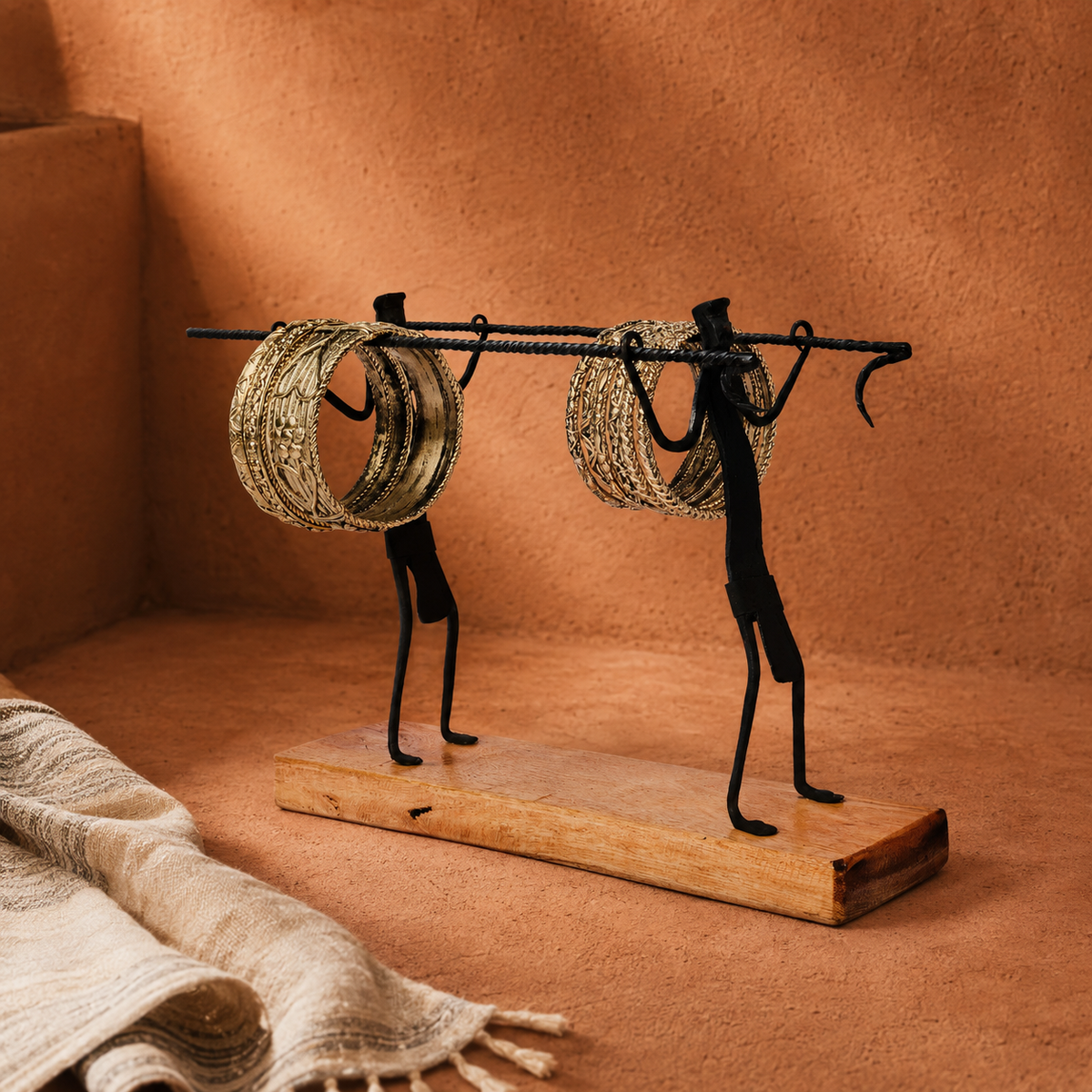 Bastar wrought iron bangle stand in an earthen craft-inspired setting
