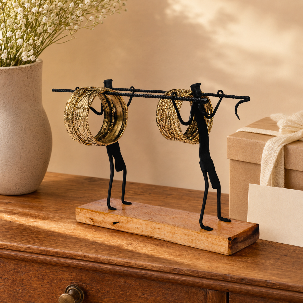 Bastar wrought iron bangle stand presented beside a handcrafted gift box
