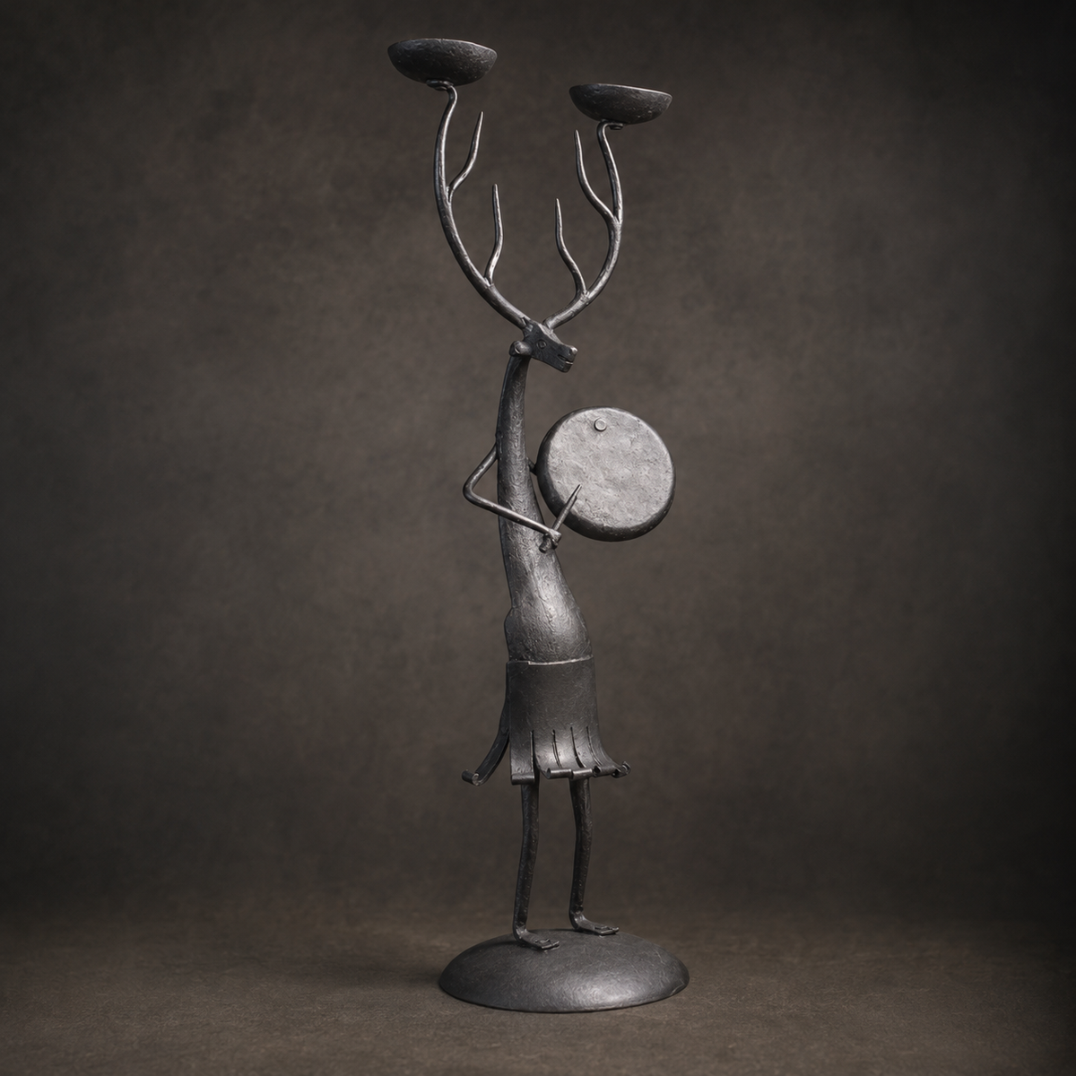 Craftsmanship view of the Bastar antlered musician candle holder and drum