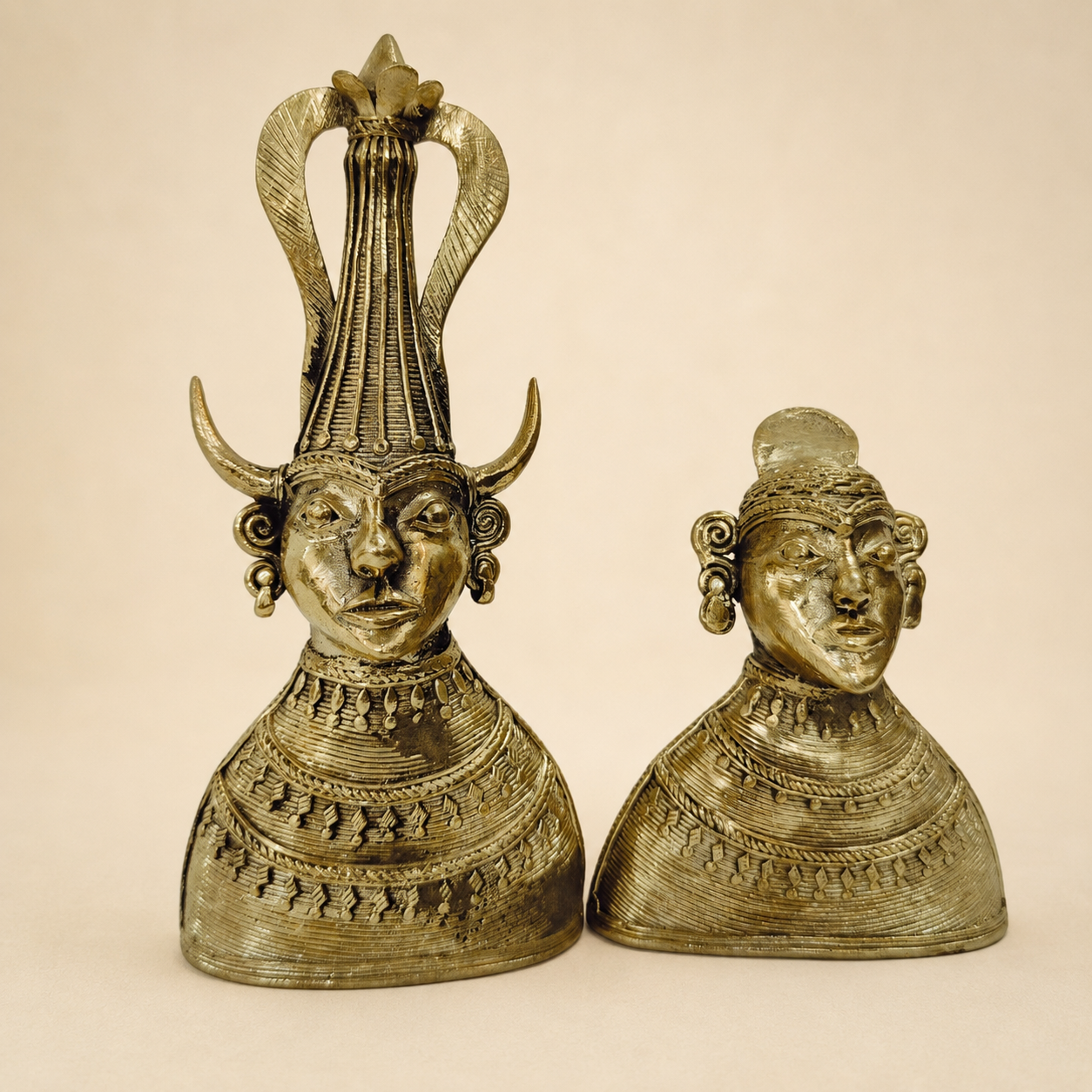 Dhokra Madia-Madin tribal couple memento on a warm ivory studio backdrop