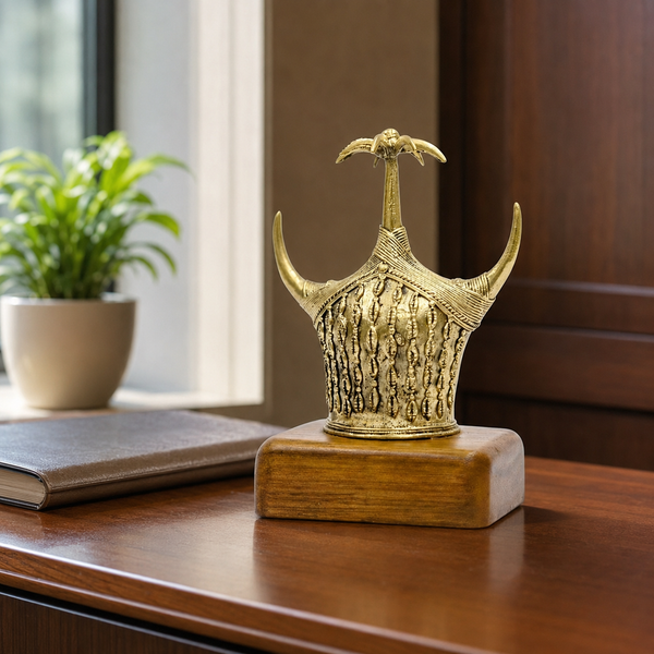 Dhokra Bison Horn memento displayed on an executive-office credenza