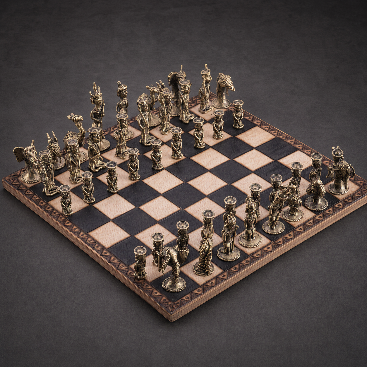 Detailed view of the complete Dhokra chess set showing tribal brass castings and engraved board border