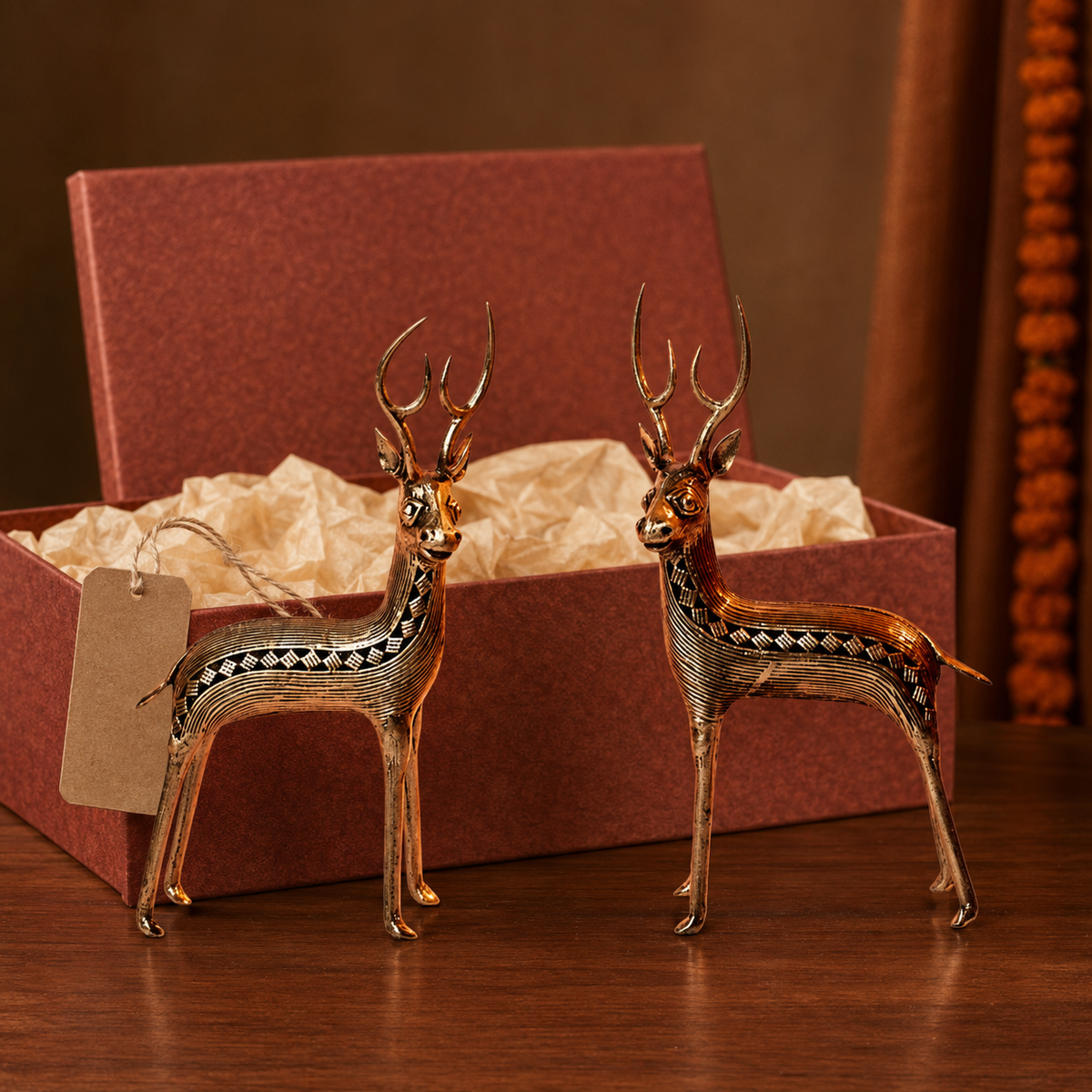 Dhokra Deer Set Design 2 pair arranged with an open handmade gift box for scale
