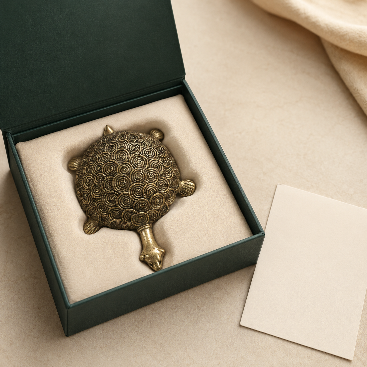 Dhokra Designer Round Turtle with spiral brass shell presented in a dark green gift box