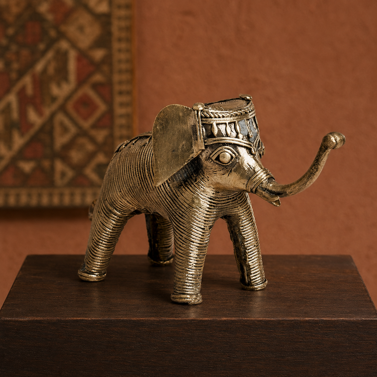 Dhokra Elephant Design 7 displayed in a terracotta Bastar craft editorial setting