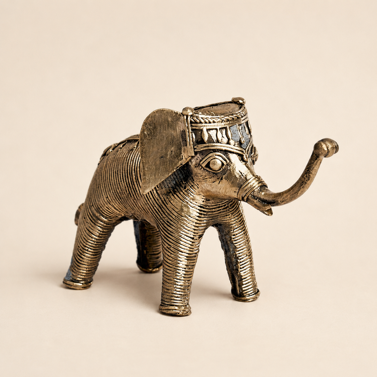 Dhokra Elephant Design 7 on a warm ivory catalogue background