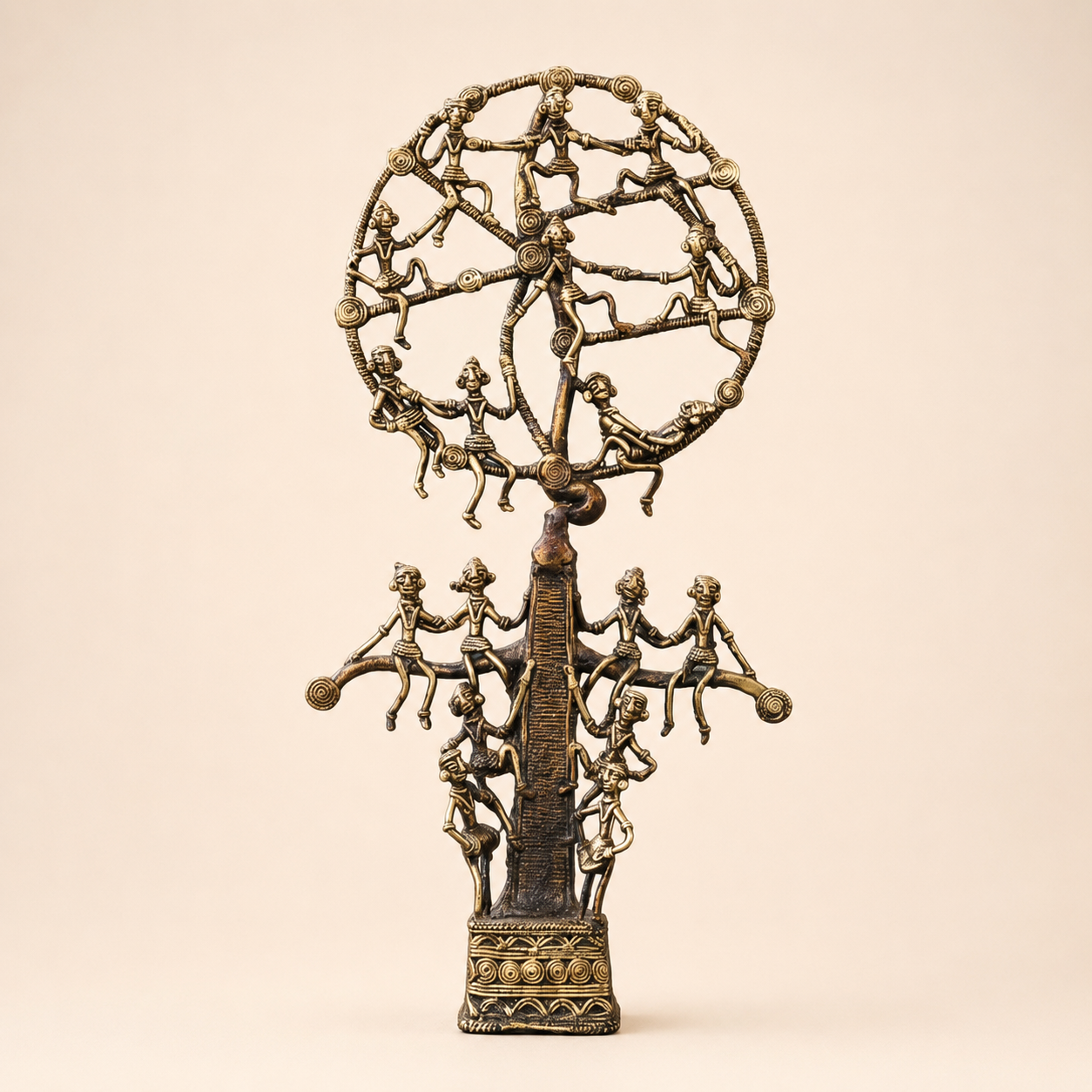 Dhokra Karma Tree of Life brass sculpture on a warm ivory studio background