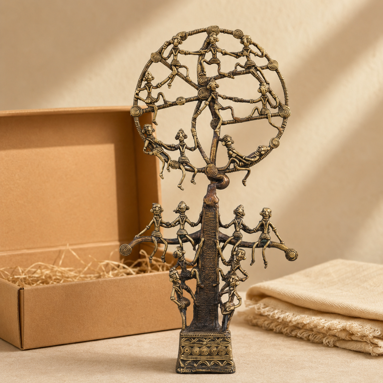 Dhokra Karma Tree of Life sculpture presented with a kraft gift box and cotton wrap