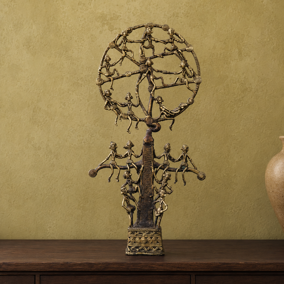 Handcrafted Dhokra Karma Tree sculpture displayed on a teak console