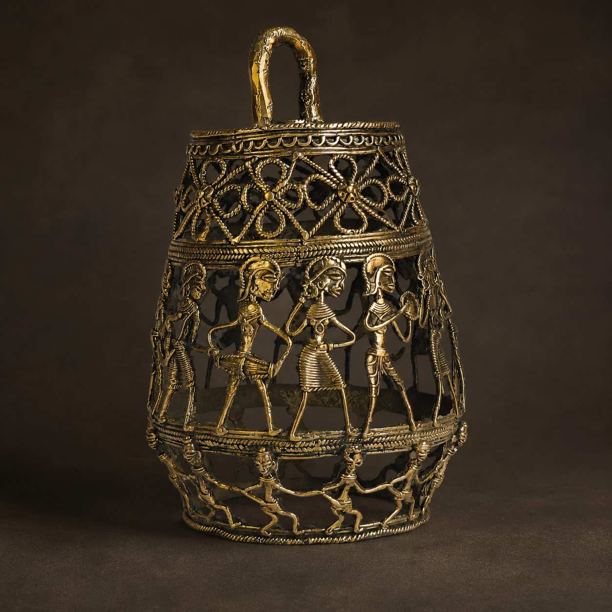 Detailed view of Dhokra Lamp Design 3 showing its handle, floral lattice, tribal figures and brass casting texture