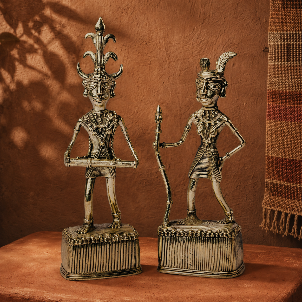 Dhokra Madia-Madin brass figures in an earthy Bastar-inspired editorial setting