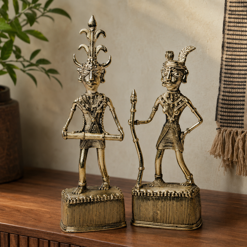 Dhokra Madia-Madin brass figures displayed on a walnut console in a calm living room