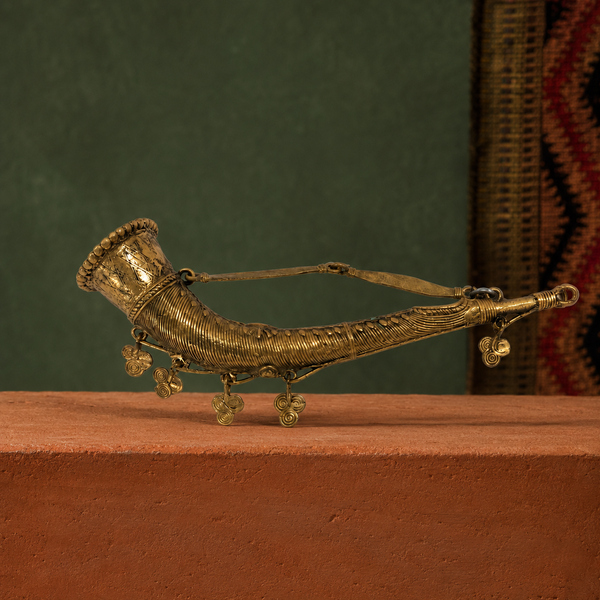 Dhokra Mini Todi on a terracotta plinth in a Bastar-inspired gallery setting