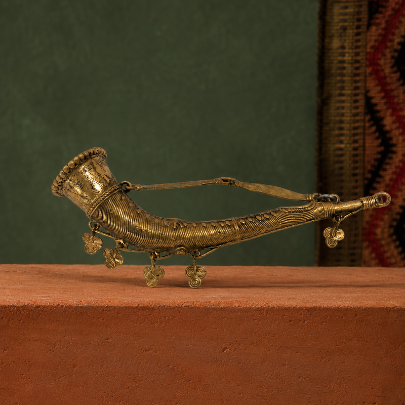 Dhokra Mini Todi on a terracotta plinth in a Bastar-inspired gallery setting