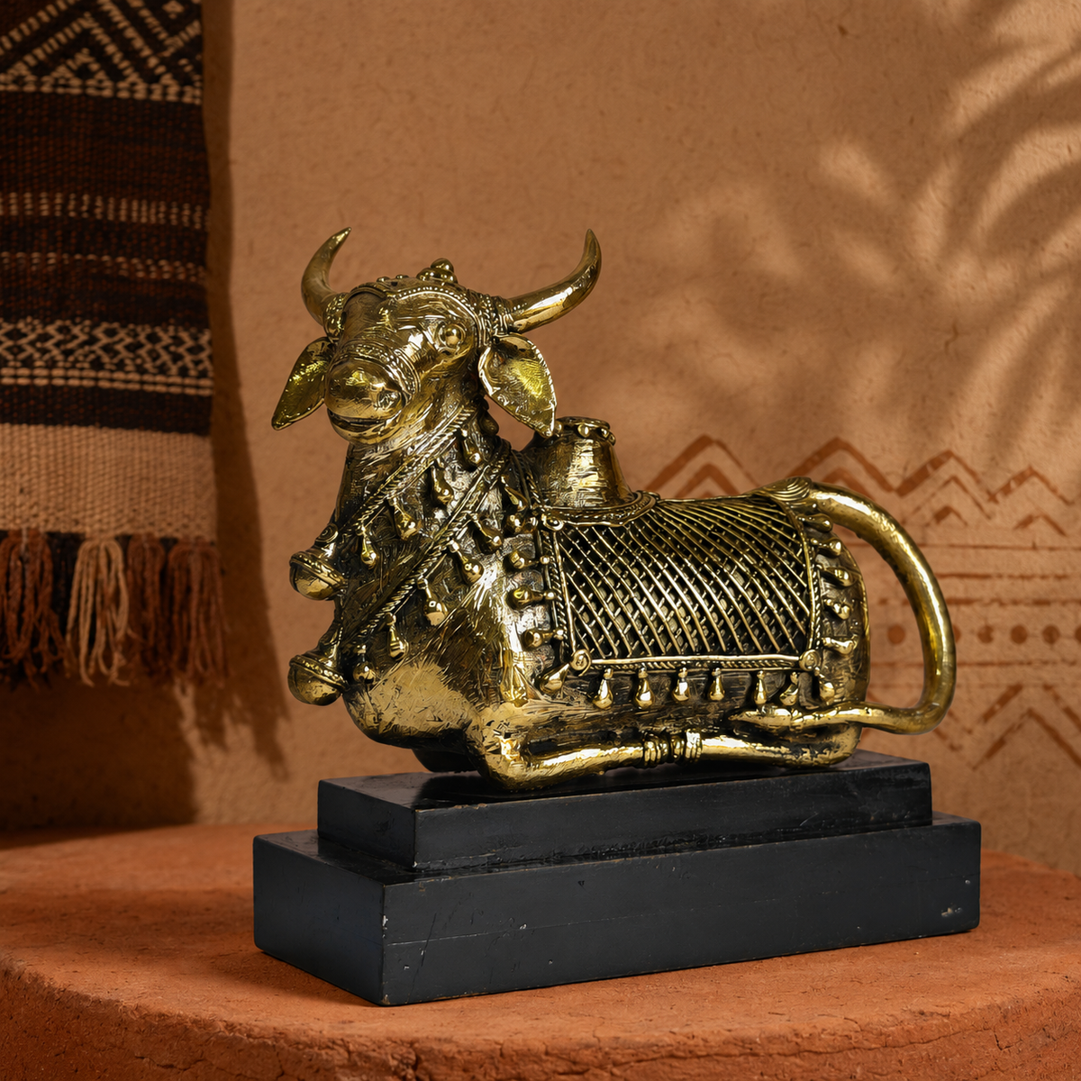Dhokra Nandi Memento Design 2 on a terracotta plinth in a Bastar-inspired setting
