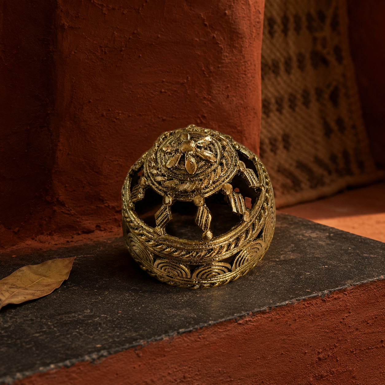 Dhokra Round Paperweight in an earthy Bastar craft-inspired setting