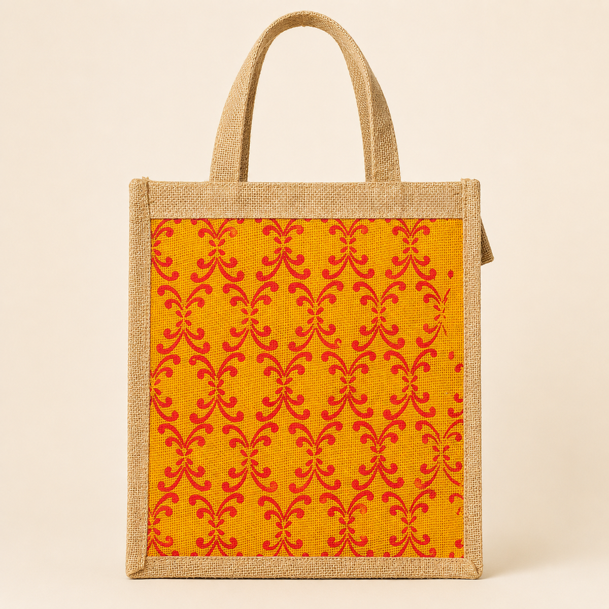 Handcrafted natural jute tote bag with mustard panel and red floral print on an ivory background