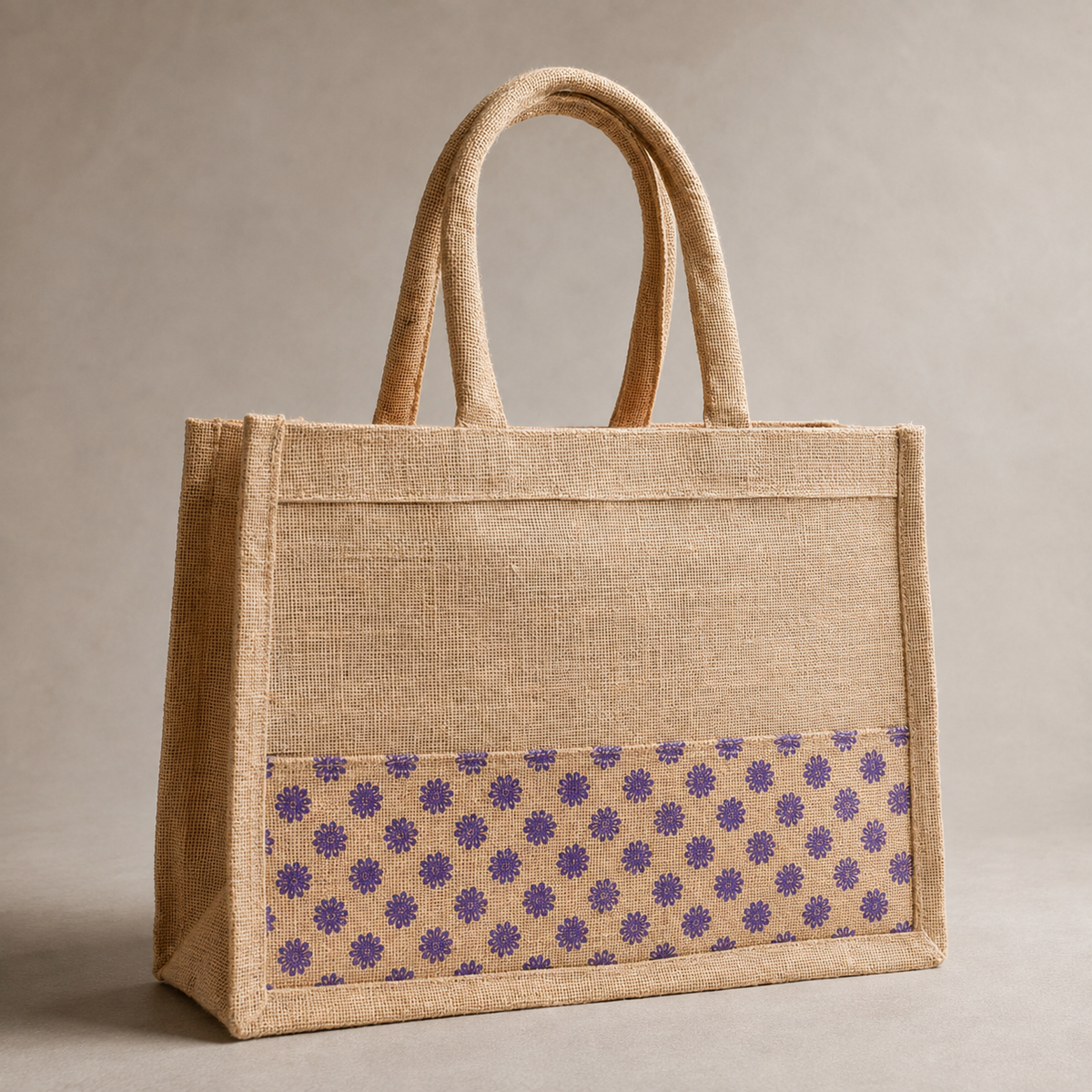 Close product view showing the woven jute texture, stitched edges, handles, and purple floral print