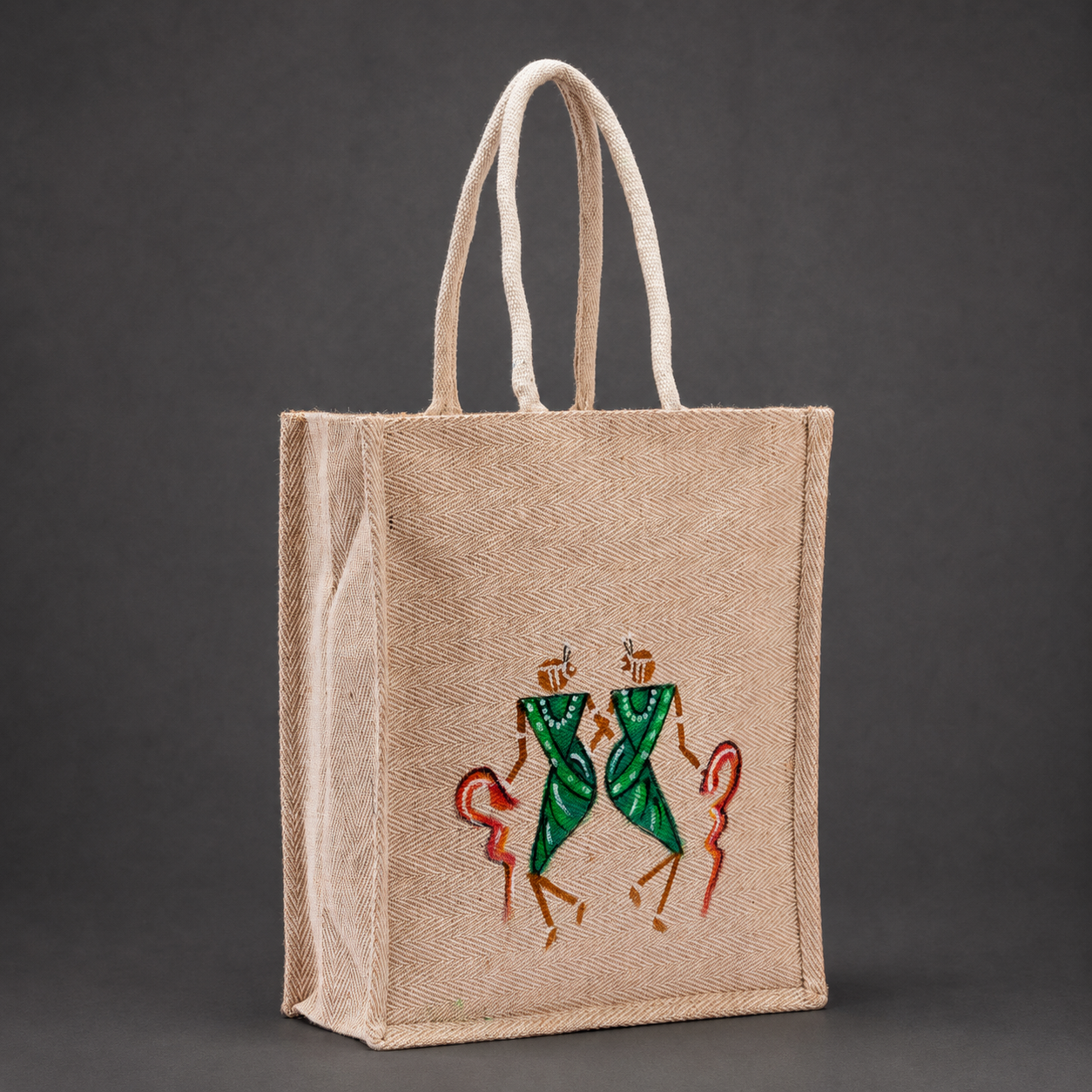 Hand-painted jute tote bag showing its herringbone weave, gusset and tribal artwork detail
