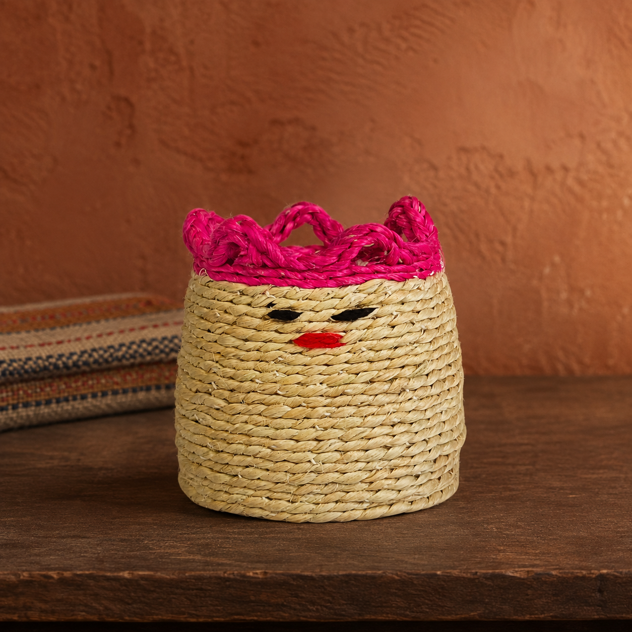 Bastar sisal pen stand displayed against a terracotta craft editorial setting