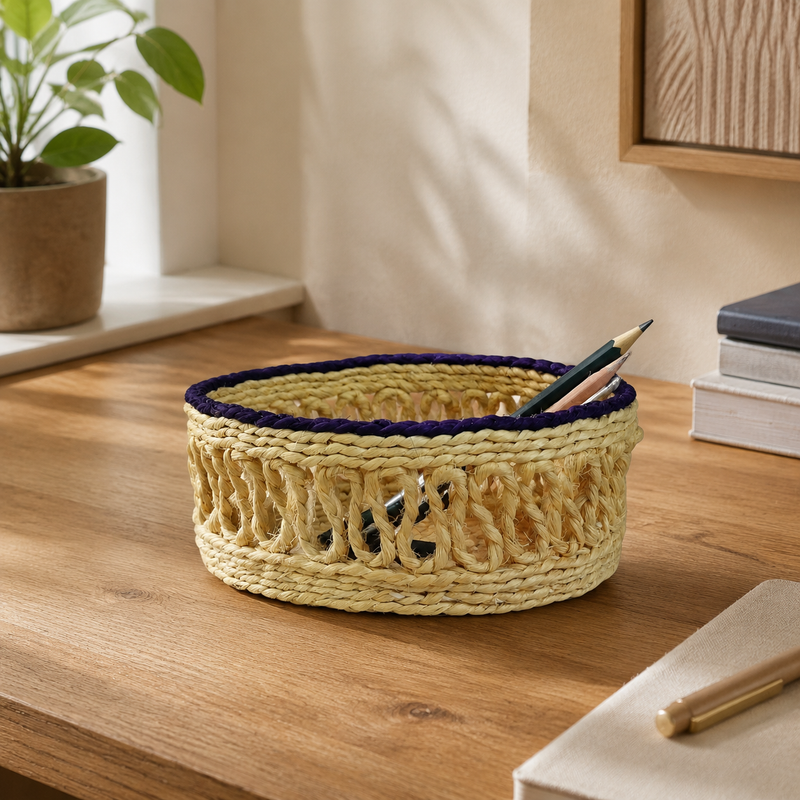 Sisal table container organising stationery on a warm wooden home-office desk