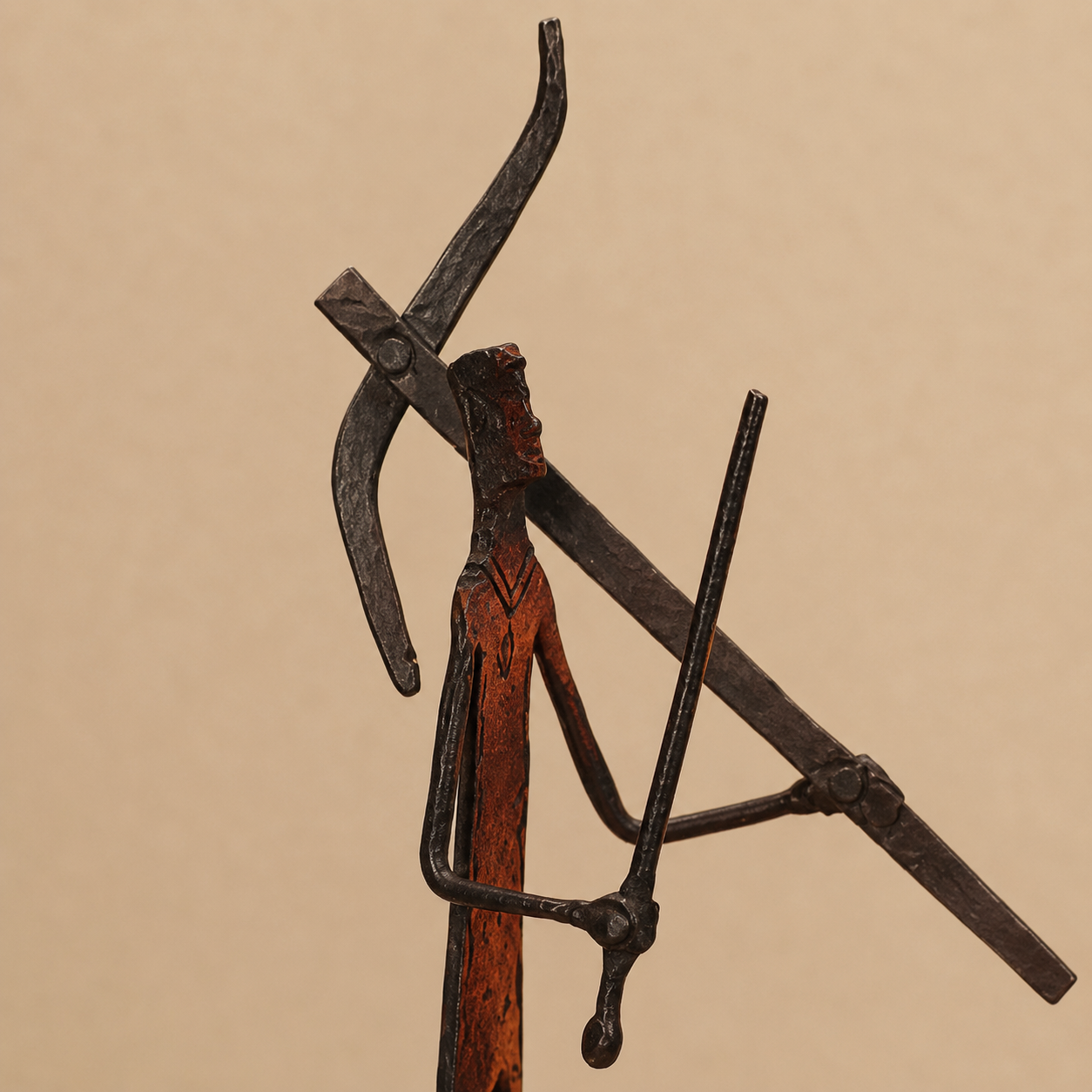 Close view of the forged bow, rods, joints, and rust-red hunter-warrior torso