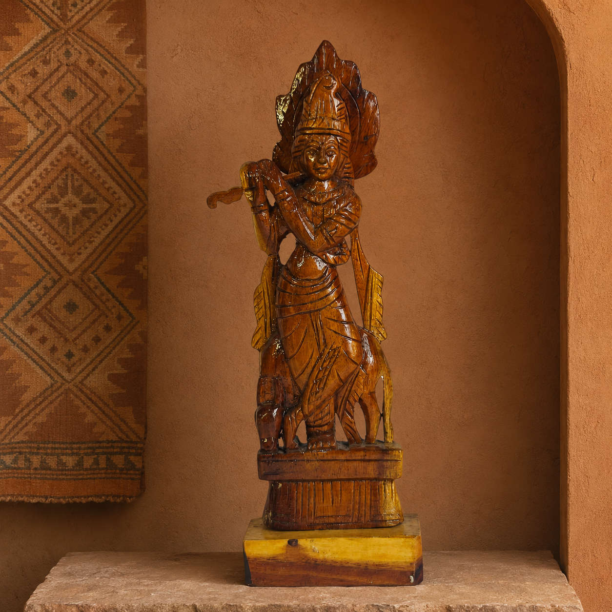 Hand-carved wooden Krishna statue presented in an earthy Bastar craft gallery alcove