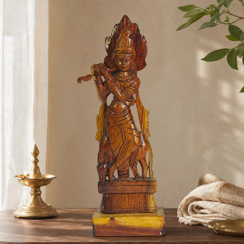 Bastar wood-carved Krishna statue displayed in a serene Indian home interior