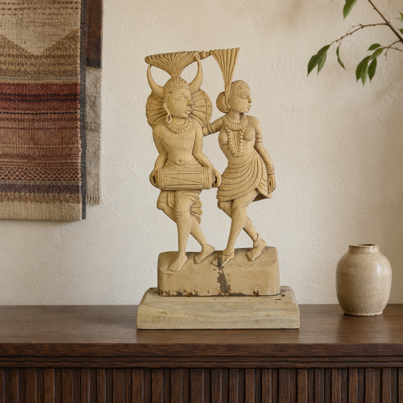 Bastar wooden Madia-Madin musician sculpture displayed on a living-room console