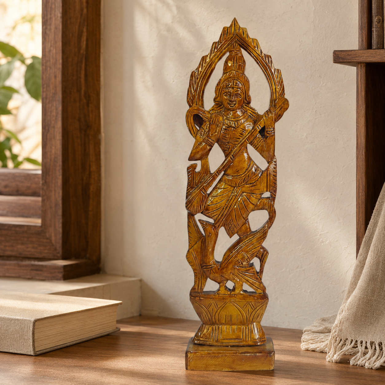 Wooden Goddess Saraswati statue displayed in a calm study-room setting