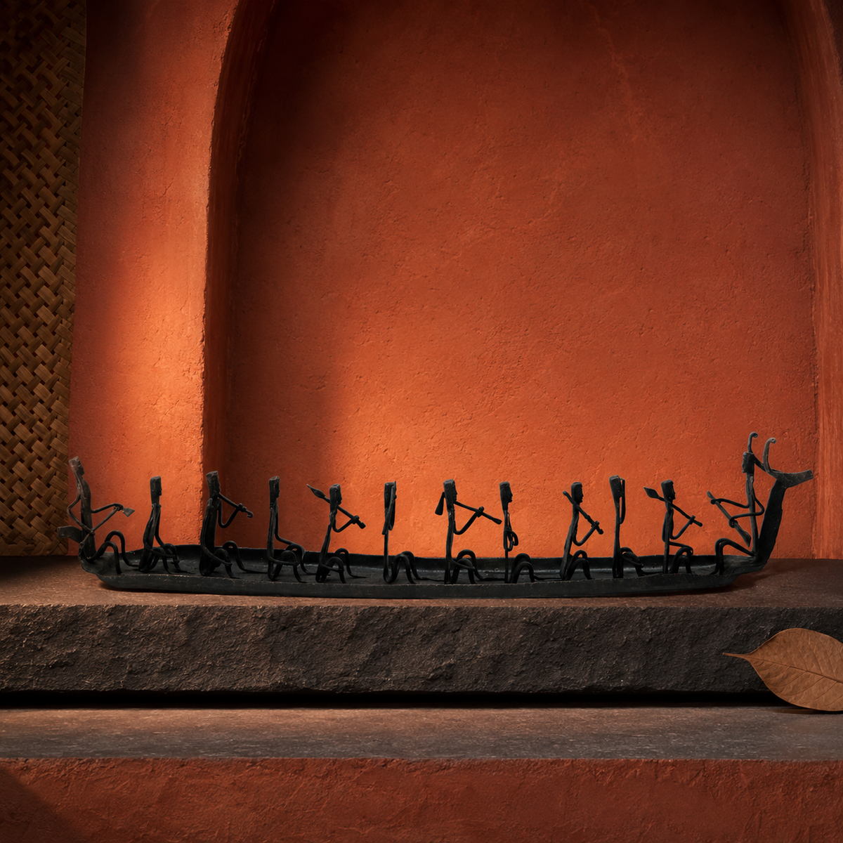 Bastar Wrought Iron Tribal Boat in an earthy Bastar craft-inspired setting