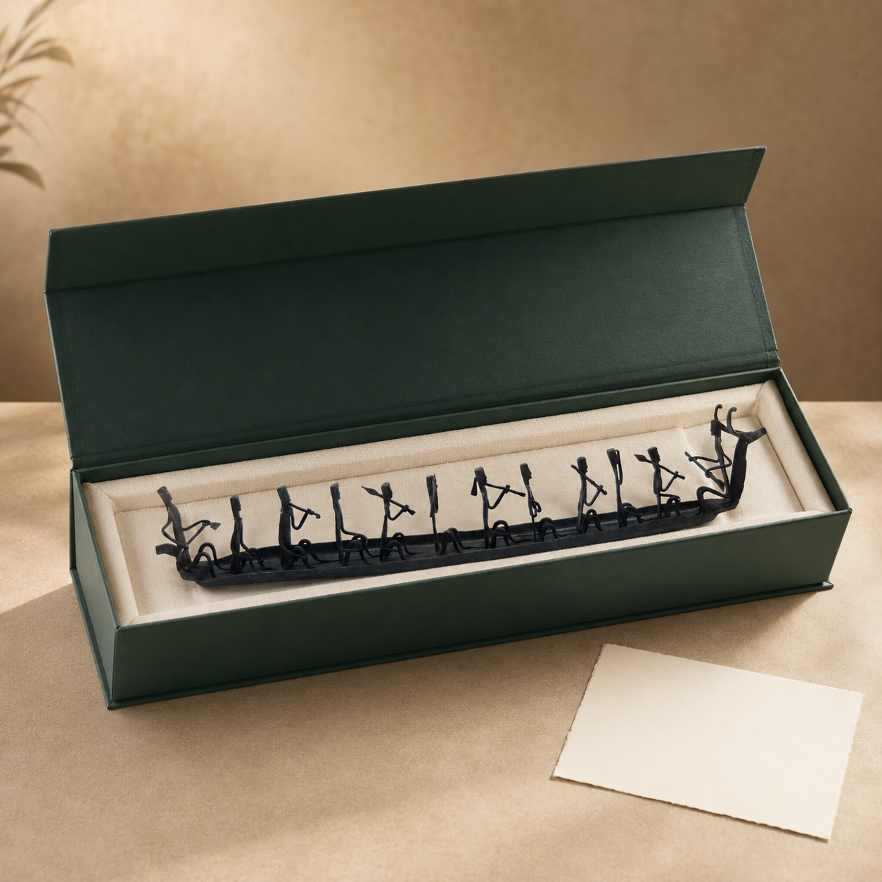 Bastar hand-forged wrought iron tribal boat with its full row of musician figurines presented in a fitted gift box