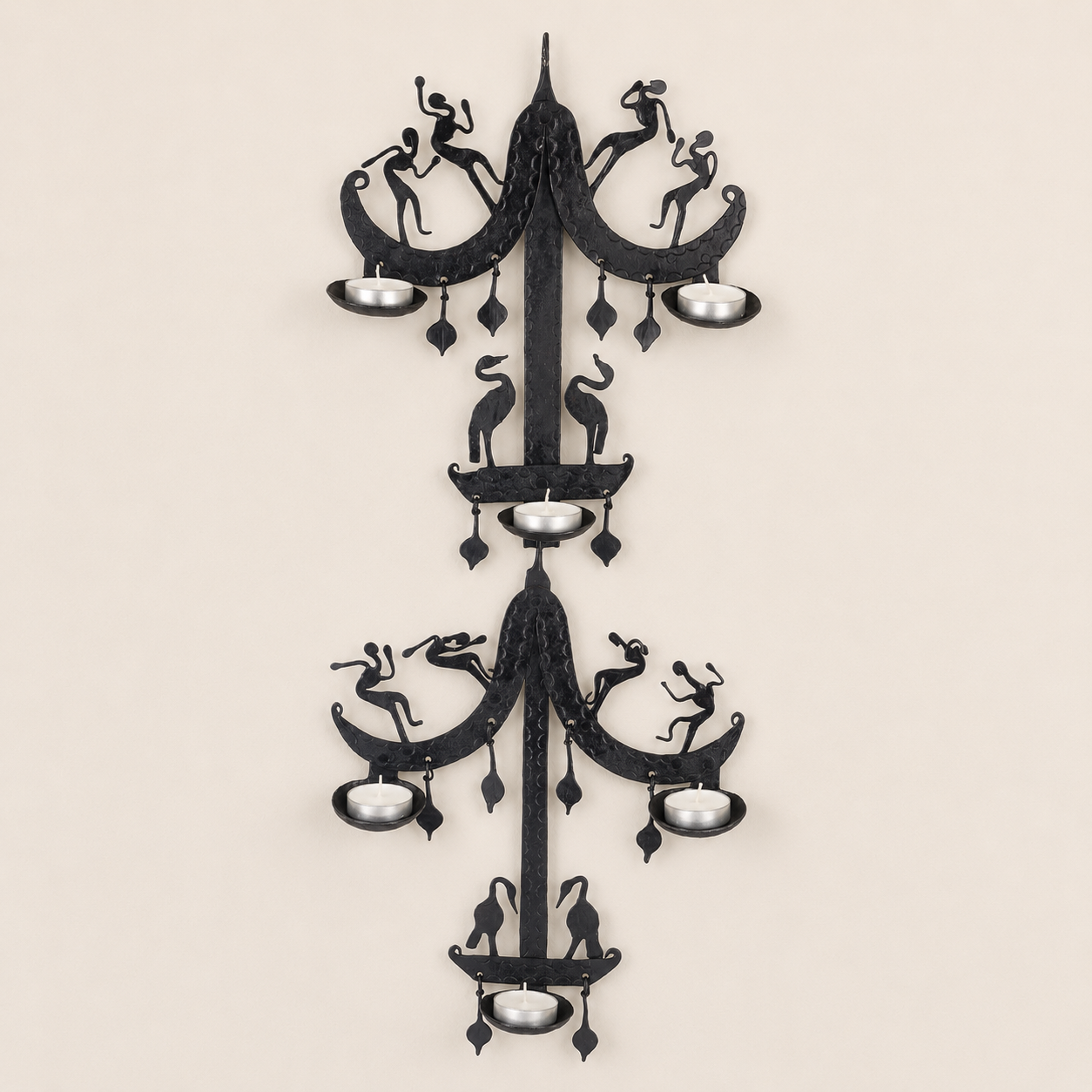 Tall Bastar wrought iron wall candle holder with dancers, birds and six tealights on ivory