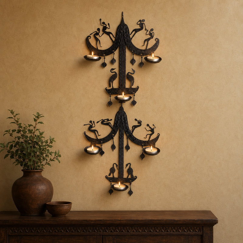 Bastar iron wall candle holder with six lit tealights above a wooden console