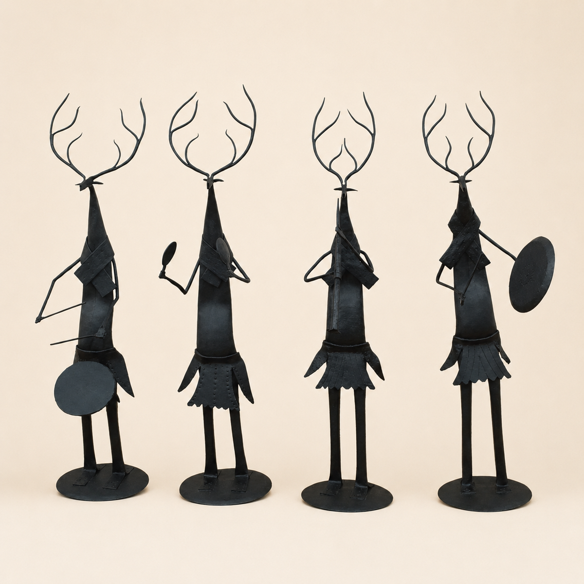 Four-piece Bastar wrought iron deer musician set on a warm ivory catalogue background
