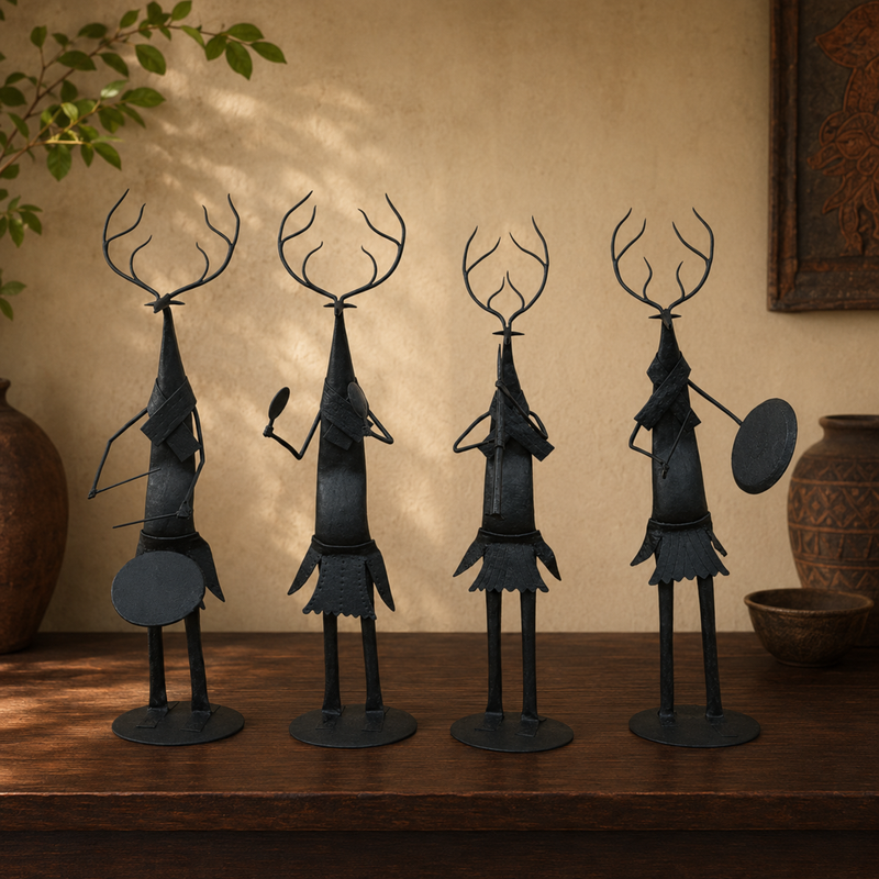 Bastar wrought iron deer musicians displayed together on a wooden console