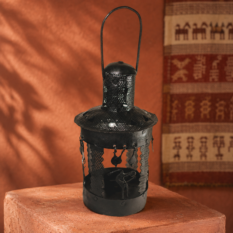Bastar wrought iron lantern in a terracotta craft editorial setting