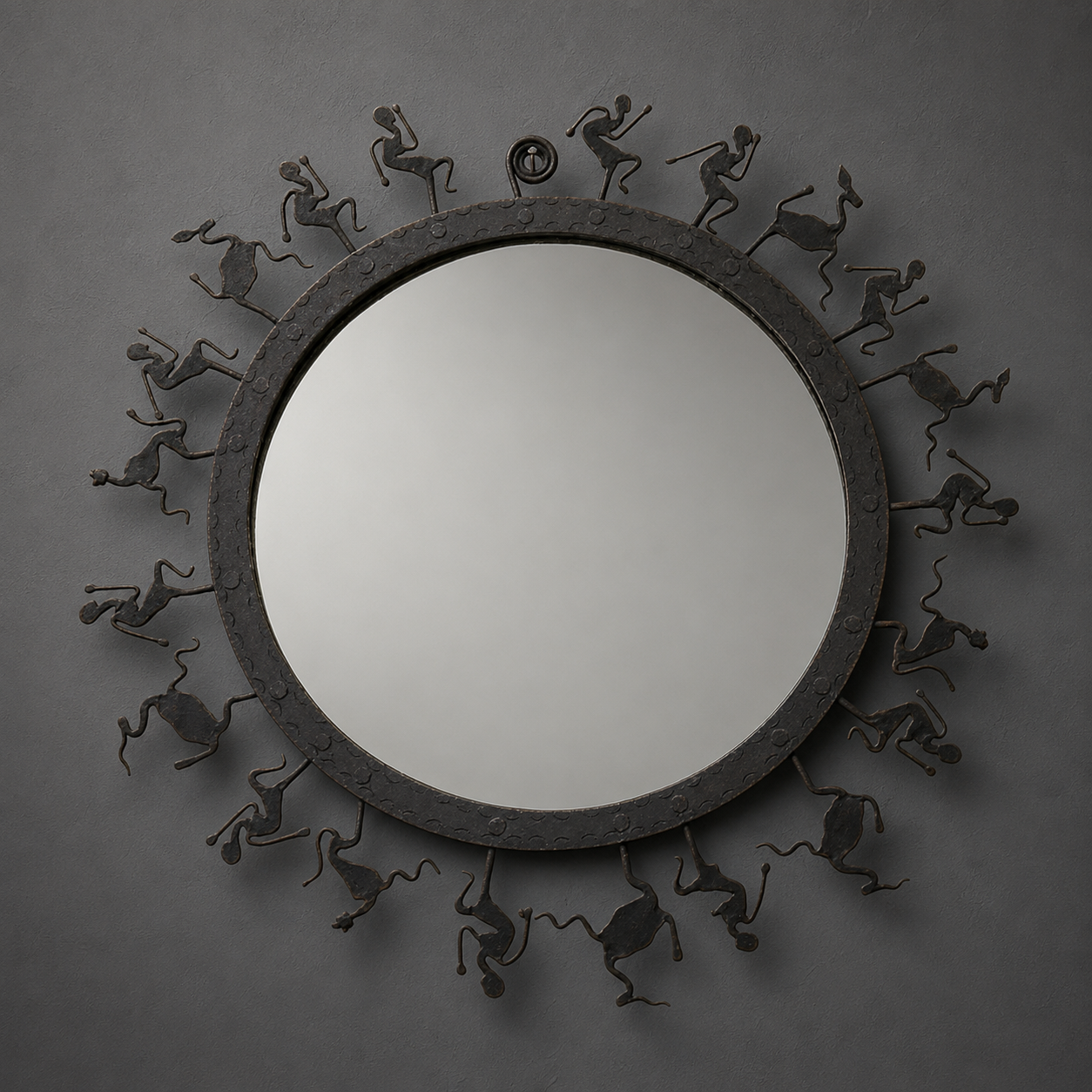 Craft detail of the incised ring and radial forged figures on a Bastar iron mirror