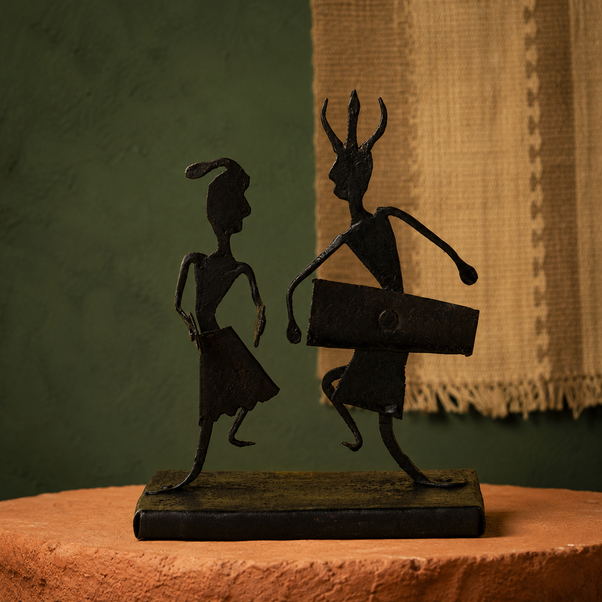 Bastar wrought iron musician memento in an earthen craft-inspired editorial setting