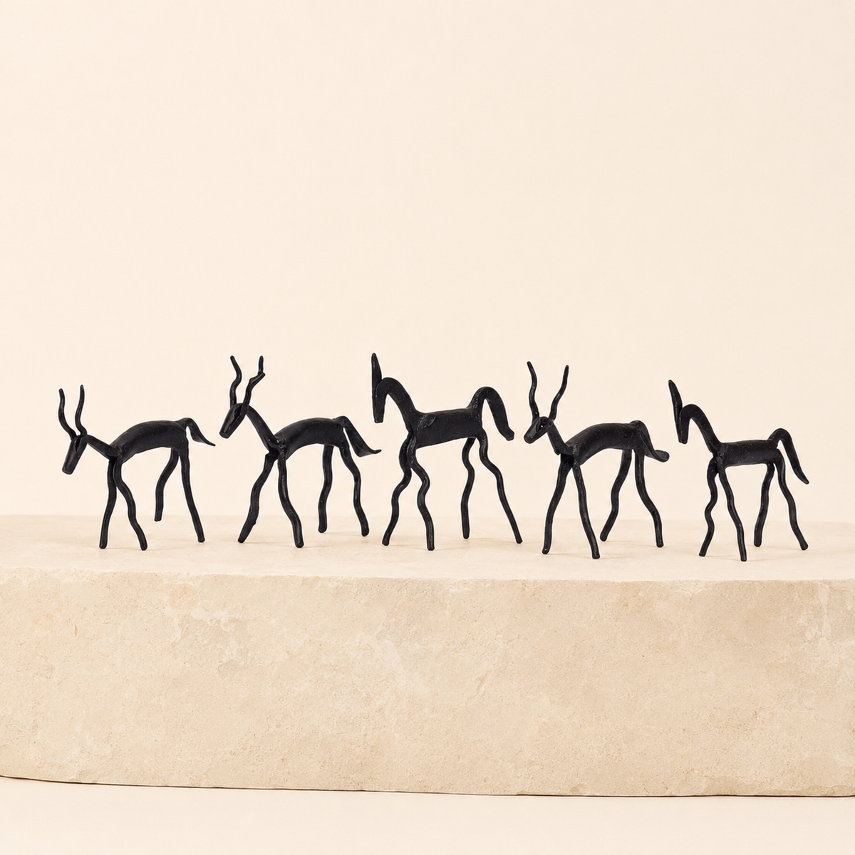 Five-piece Bastar Wrought Iron Tribal Animal Set on a sandstone plinth